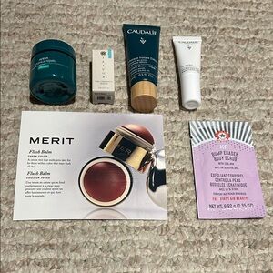 Lot of deluxe travel size beauty products -  Caudalie, Aveda, Tatcha, Merit